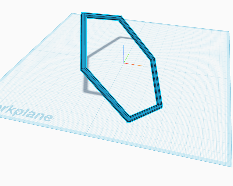 The hexagon tilted at an angle, half sunk into the workplane.