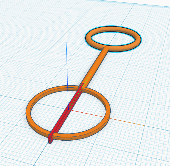 The wand with one ridge box lying across the ring.