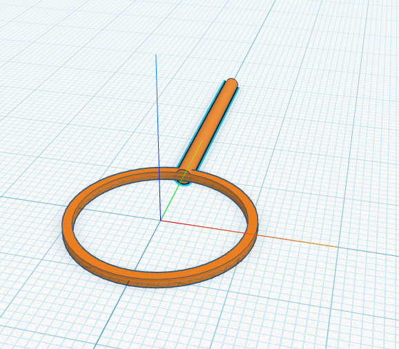The handle attached to the edge of the ring.
