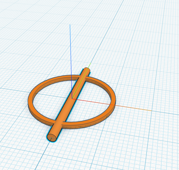 The handle lying flat, poking through the middle of the ring.