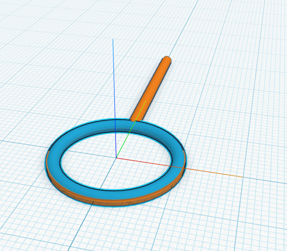 A blue ring sitting in the middle of the wand's ring.