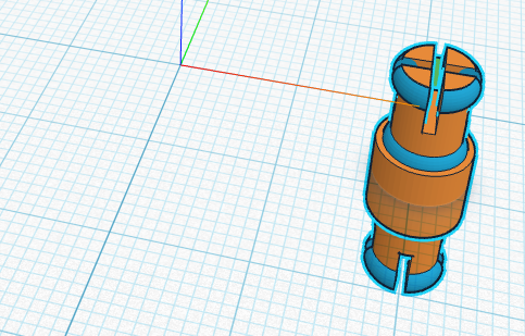 One solid grouped axle with X slits cut, positioned away from the center.