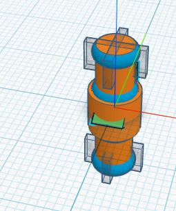 The full axle assembly with the green truck triangle at its center.