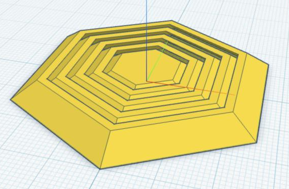The finished hex fidget: four nested hexagon rings around a solid center.