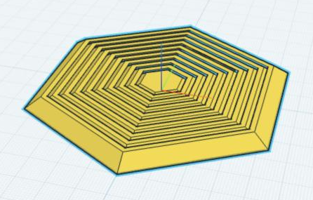 The fidget at 100 millimeters wide, with more rings than before.