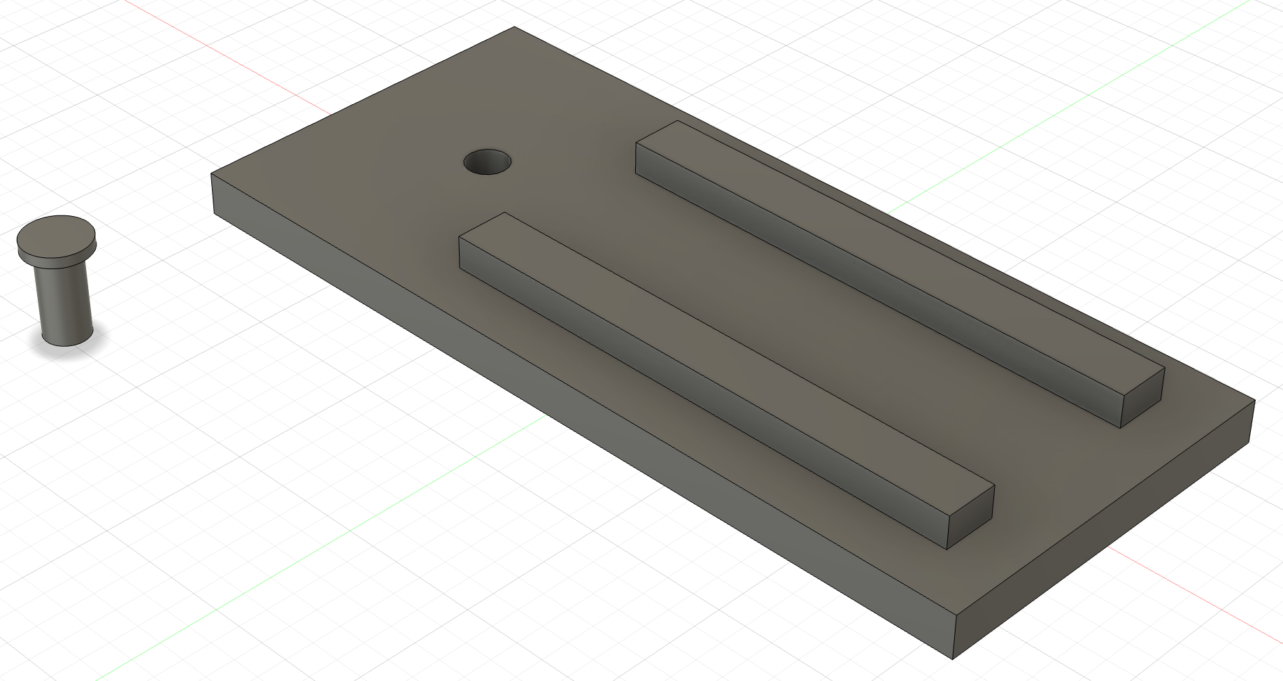The Axle sitting on the grid beside the Base.