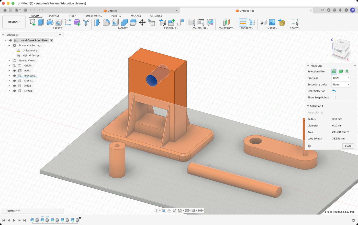 The Measure dialog with the inside of the Bracket's axle hole selected, showing a diameter of 6.20 mm.